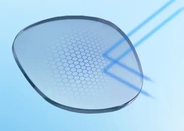 Specscart blue light glasses banner featuring a crystal-clear lens deflecting blue light beams with a visible hexagonal honeycomb filter pattern.