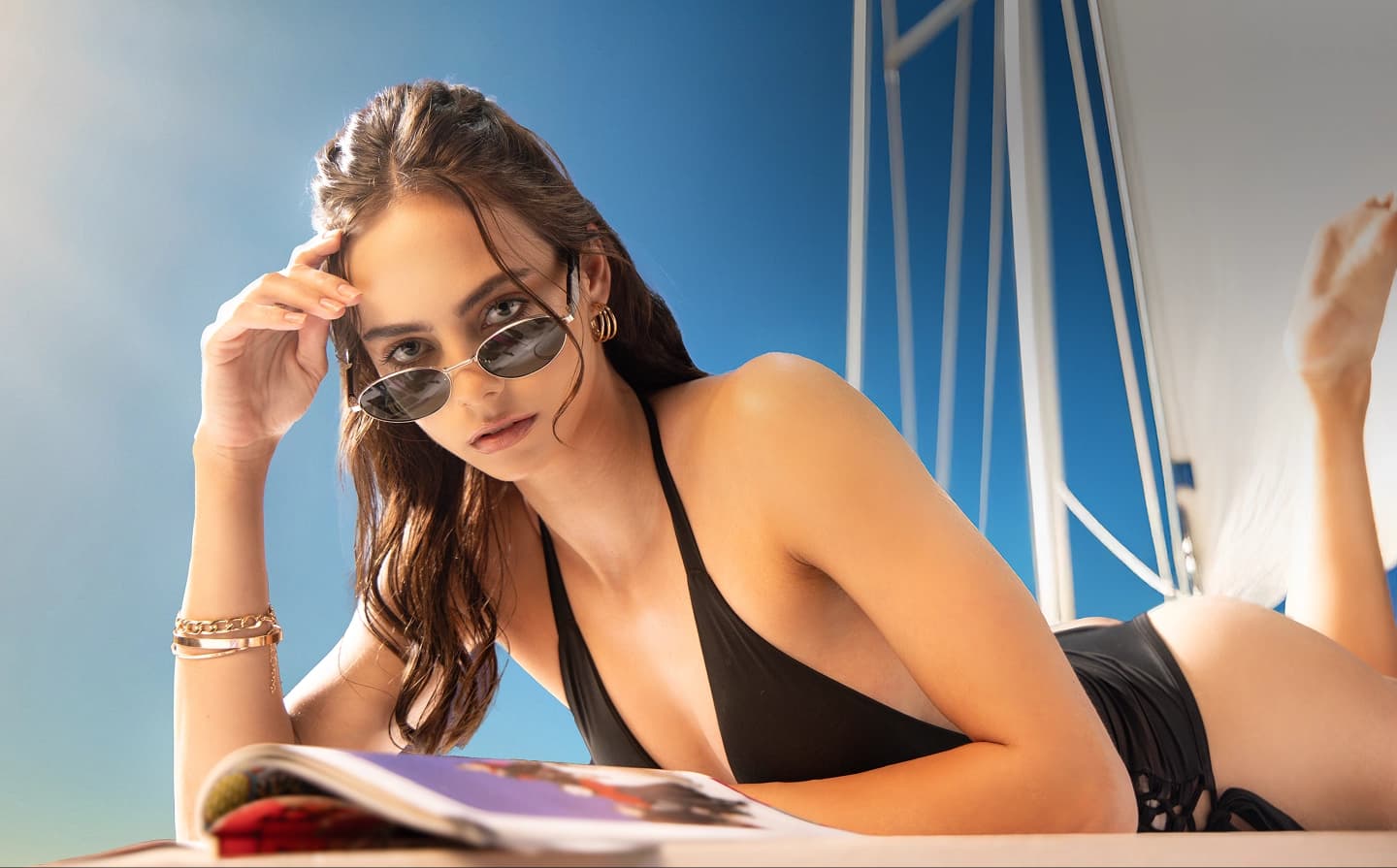 "I was reading by the pool when I spotted them," she confesses. "It was
        love at first sight — my new frames made every sunset more
        breathtaking."