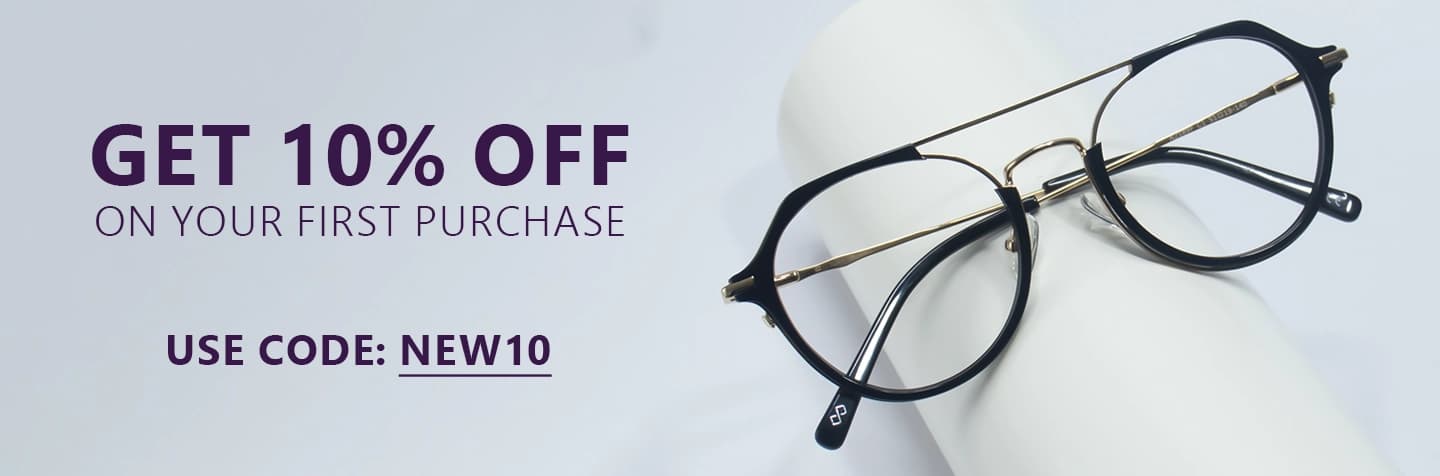 Banner with text ‘Get 10% Off On Your First Purchase. Use Code: NEW10’ alongside a pair of round black glasses with thin gold detailing, placed on a white cylindrical surface.