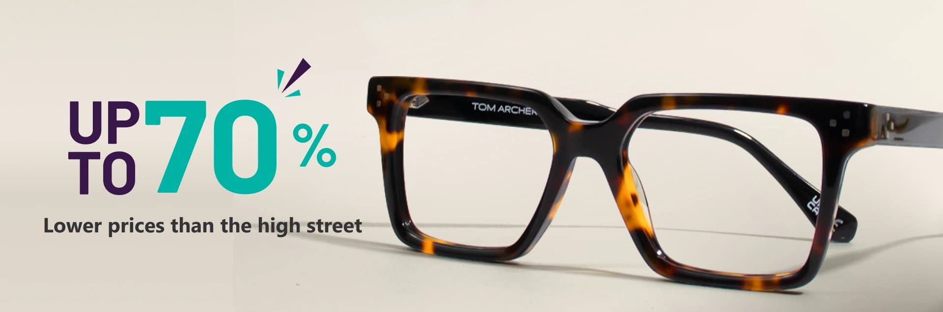 Banner highlighting ‘Eyewear At 70% Off, Less Cost Than High Street’ with large blue text and a pair of geometric blue-rimmed Specscart glasses on the right side, set against a simple pale backdrop.