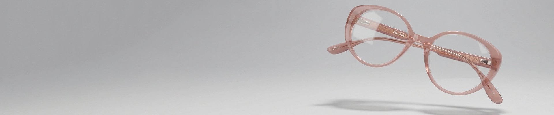 Oval Glasses Bold amber-coloured oval eyeglasses with thick round rims, displayed on a clean white background