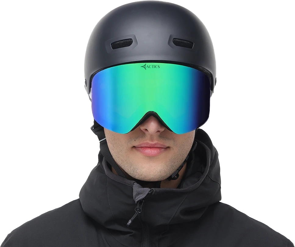 falcon 2 Front view of the Specscart Falcon ski goggles for amateur skiers, featuring a blue-green mirrored lens, black frame accented with Actics branding, worn with a matte black ski helmet and zipped black winter jacket.