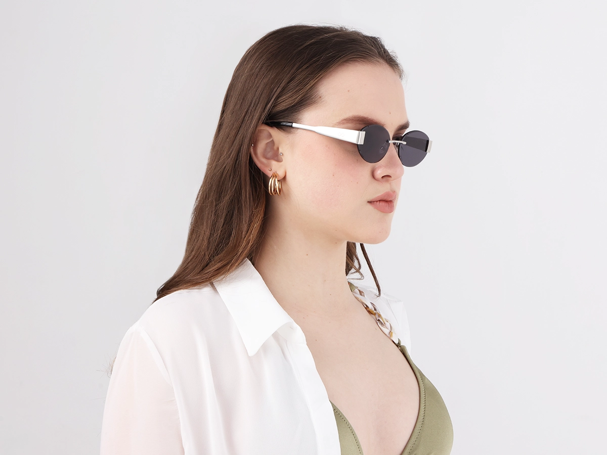 Oval Silver Rimless Sunglasses With Blue Tint-1