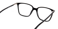black-glasses-in-rectangular-cat-eye-frames-1