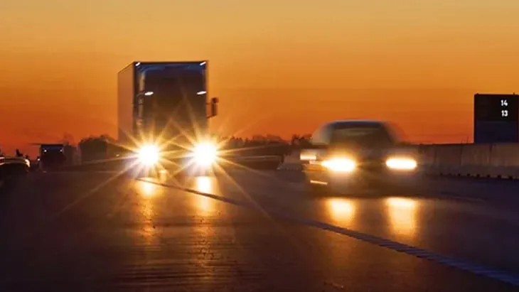 Image of glaring lights on a road 