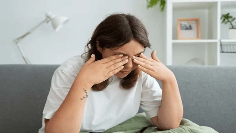 Image of a woman experiencing eye strain