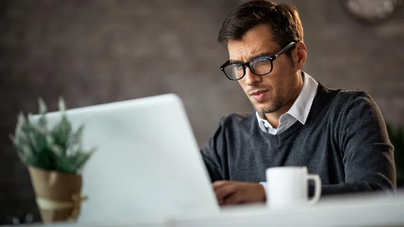 man working on laptop