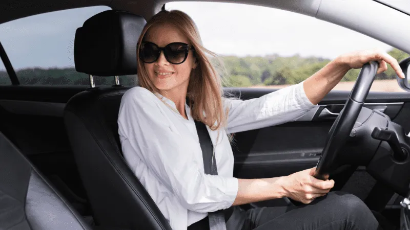 Women
  Driving A Car